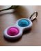 Breloc jucarie-senzoriala Tomy Fat Brain Toys - Simple Dimple, albastra/roz - 3t