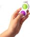 Breloc jucarie-senzoriala Tomy Fat Brain Toys - Simple Dimple, verde/mov - 3t