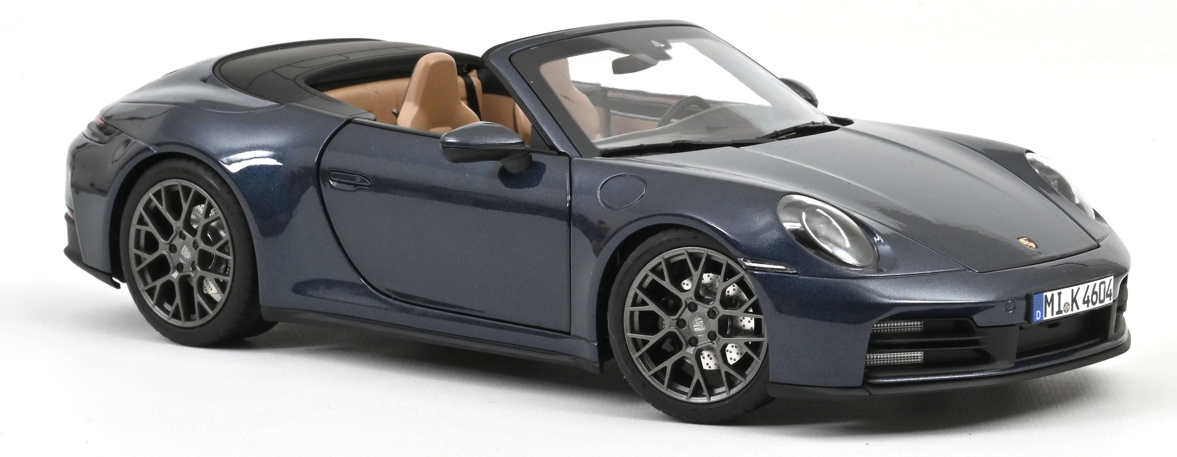 Model de colecționar  NOREV Modern: Mașini  - Porsche 911 Carrera Cabriolet 2025 Yachting Blue Metallic